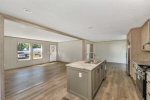 Open-concept interior of a double wide manufactured home sold by Northern Mobile Homes, a mobile home dealer in Tilton NH