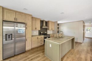 Modern kitchen inside a manufactured home sold by Northern Mobile Homes, a manufactured home dealer in Tilton NH