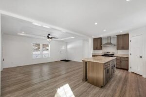 Open-concept interior of a manufactured home sold by Northern Mobile Homes, a mobile home dealer serving New Hampshire