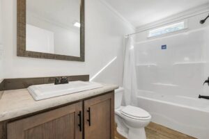 Bathroom interior inside a mobile home sold by Northern Mobile Homes, a mobile home dealer in Rochester NH