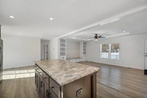 Open-concept living and kitchen interior inside a manufactured home sold by Northern Mobile Homes, a manufactured home retailer in Ashland NH