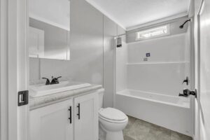 Bathroom interior inside a manufactured home sold by Northern Mobile Homes, a manufactured home dealer serving Maine and New Hampshire