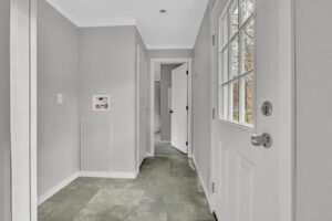 Utility and entry hallway inside a manufactured home sold by Northern Mobile Homes, a mobile home dealer serving Maine and New Hampshire
