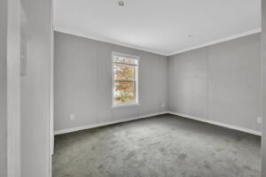 Bedroom interior inside a manufactured home sold by Northern Mobile Homes, a manufactured home dealer serving Maine and New Hampshire