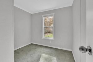 Secondary bedroom inside a mobile home sold by Northern Mobile Homes, a mobile home dealer serving Maine and New Hampshire