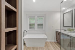 Luxury primary bathroom with soaking tub inside a manufactured home sold by Northern Mobile Homes, a manufactured home dealer in Lyndeborough NH