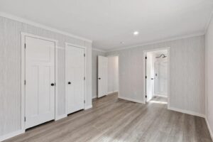 Bedroom interior of a manufactured home sold by Northern Mobile Homes, a mobile home dealer in Seabrook NH