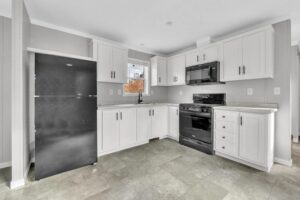 Kitchen interior of a manufactured home sold by Northern Mobile Homes, a mobile home dealer serving Maine and New Hampshire